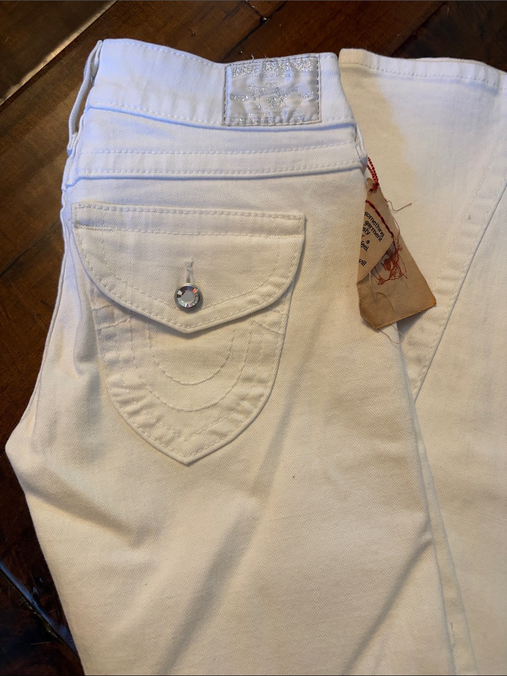 True Religion Women's White Flare Jeans with Rhinestone Pocket Button
